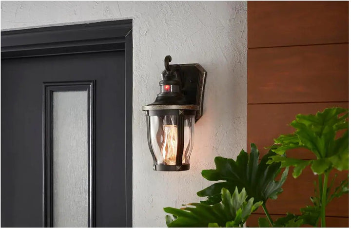 McCarthy 1-Light Bronze with Gold Highlights Motion Sensing Outdoor Wall Mount Lantern